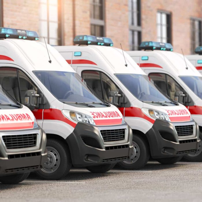Ambulance cars in a row on a parking of hospital.